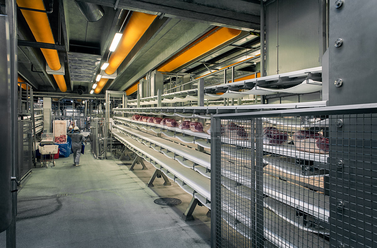 Yellow, industrial ducting systems installed in Danish Crown meat processing factory, DK, 2
