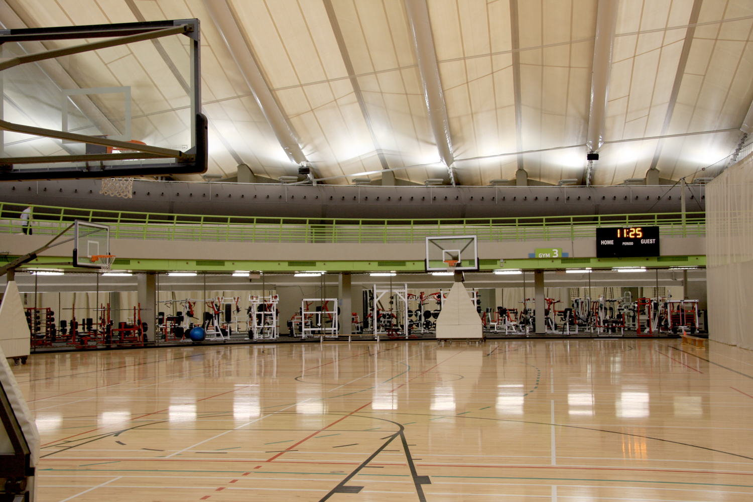 White ducts for air conditioning installed in Talisman Sports Center, Canada