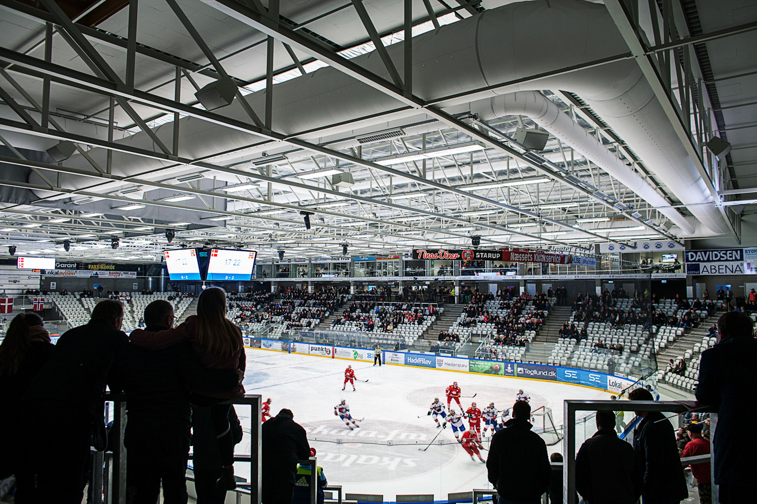 White ducts for air conditioning inside an indoor ice rink, 2