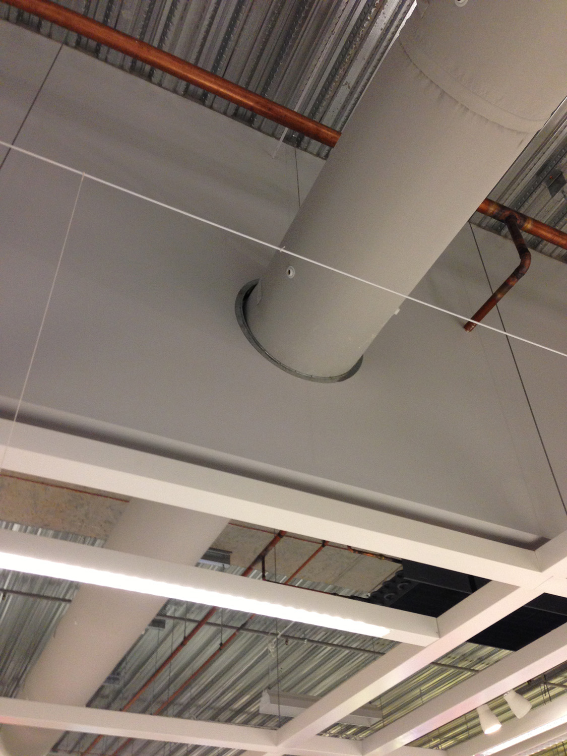 White duct for air conditioning in IKEA, Springvale, AU, 2