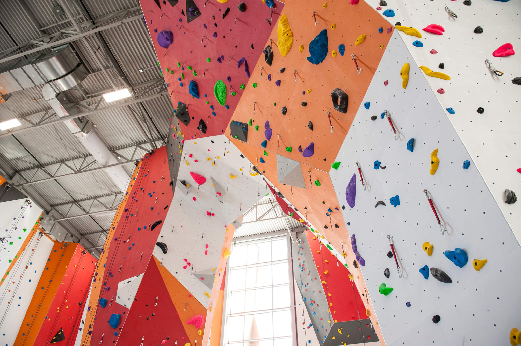 Grey ducts for air conditioning in Canyon Escalade rock climbing gym, Canada