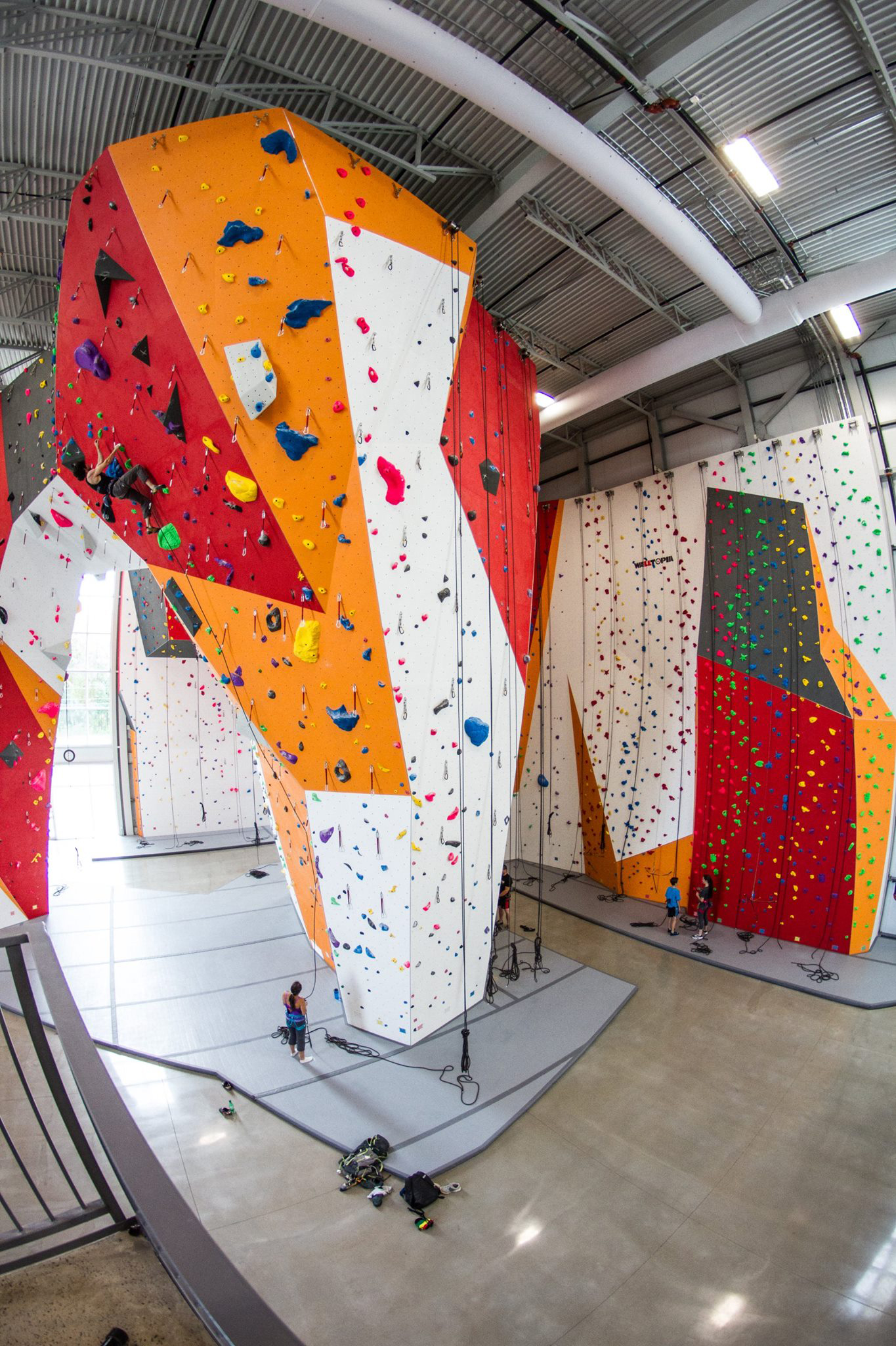 Grey air ducts inside Canyon Escalade rock climbing gym, Canada