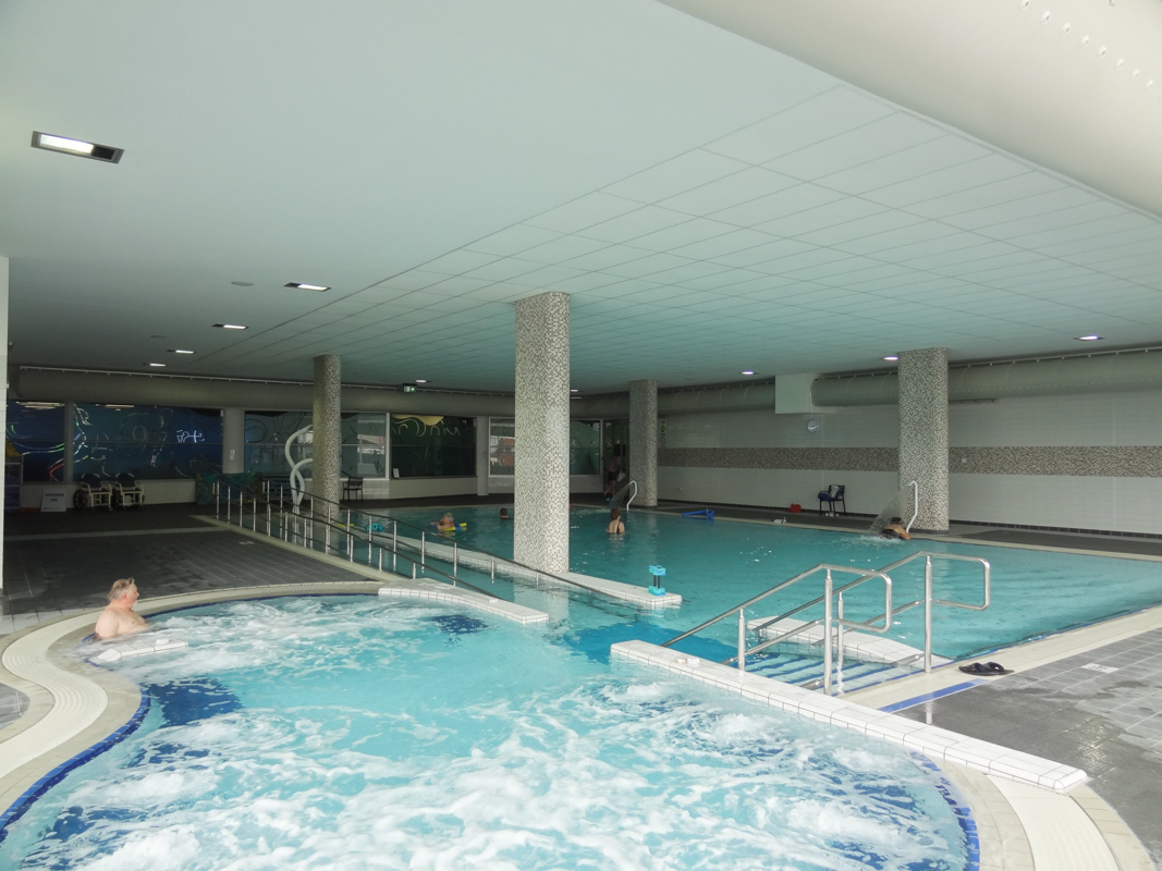 White oval ductwork inside WaterMarc indoor swimming pool, Australia