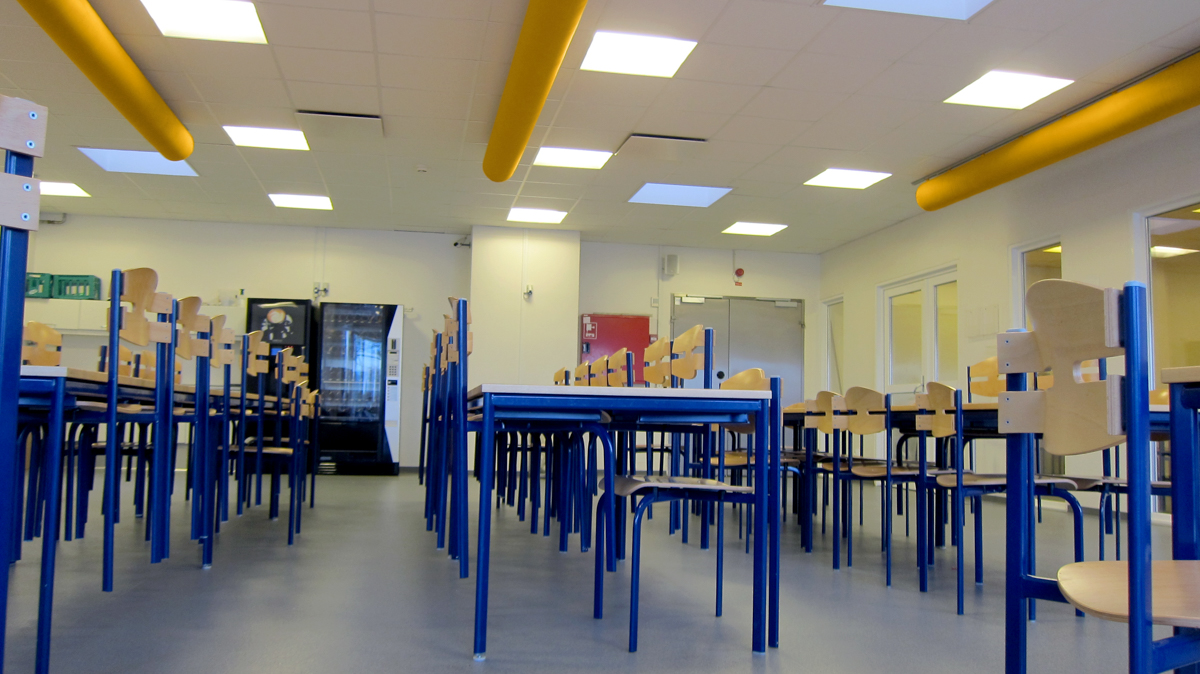 Yellow air ducts installed in Danish Crown cafeteria, Blans, Denmark, 2