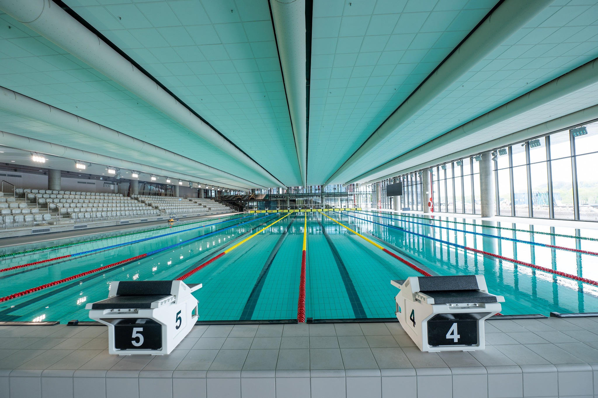 White duct systems inside an indoor swimming pool in Kaunas, Lithuania, 2