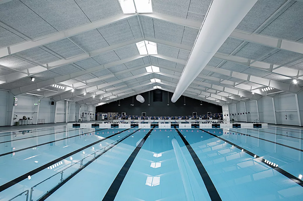 White fabric duct inside Taastrup indoor swimming pool, DK