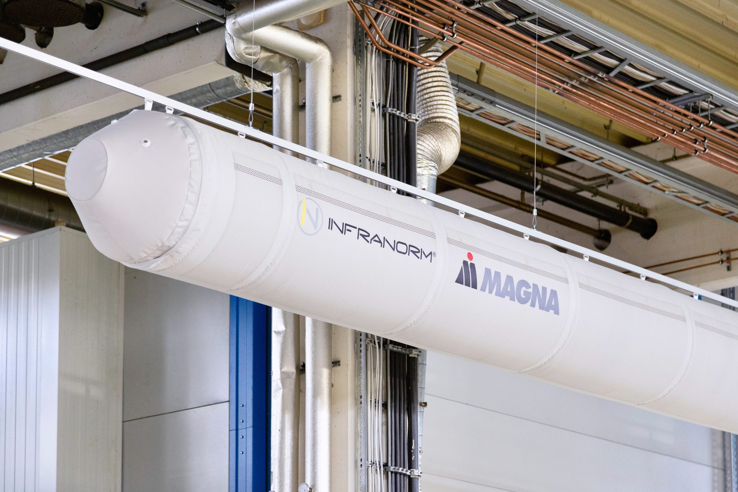 White industrial duct in Magna InfoNorm factory, Germany