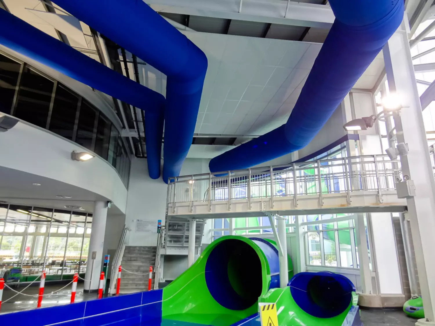 Blue ducts for air conditioning inside Greensborough swimming facilities, Australia