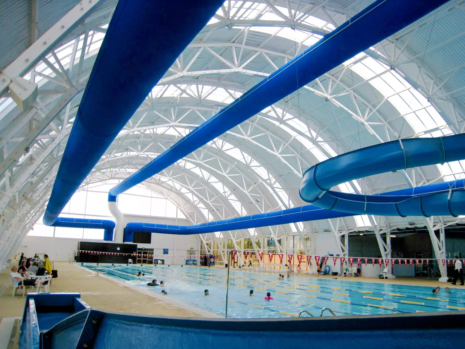 Blue oval ductwork installed in Elizabeth Aquadome swimming pool, Australia