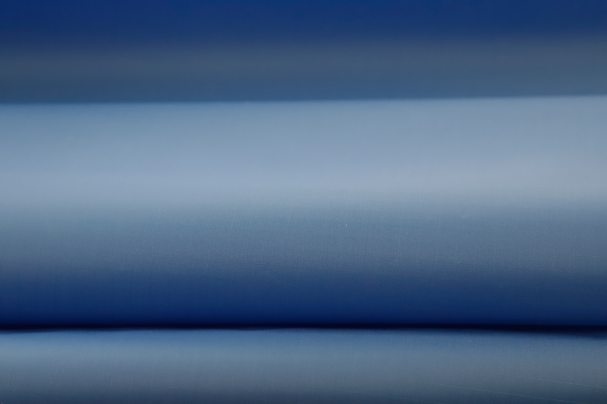 Glattes blaues Textilmaterial für die Herstellung von Textilkanälen