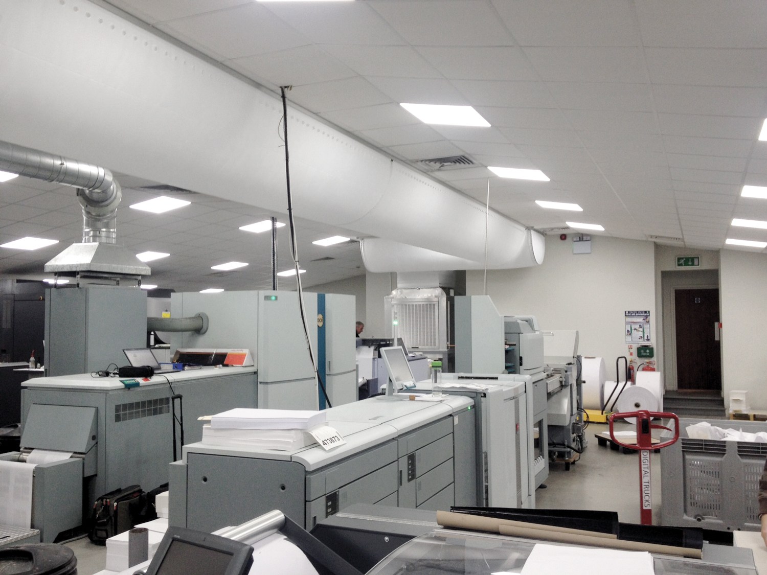 White fabric duct inside Henry Ling office, UK