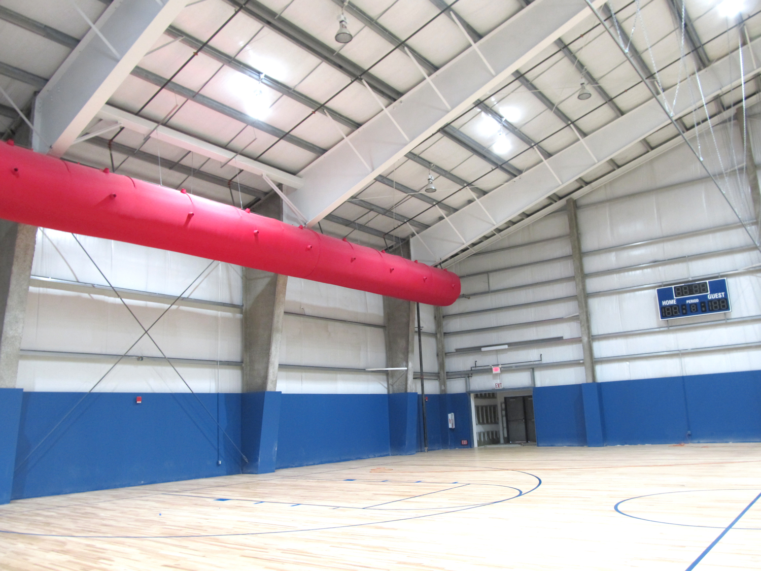 Red fabric duct in Chelsea Piers sports arena, US