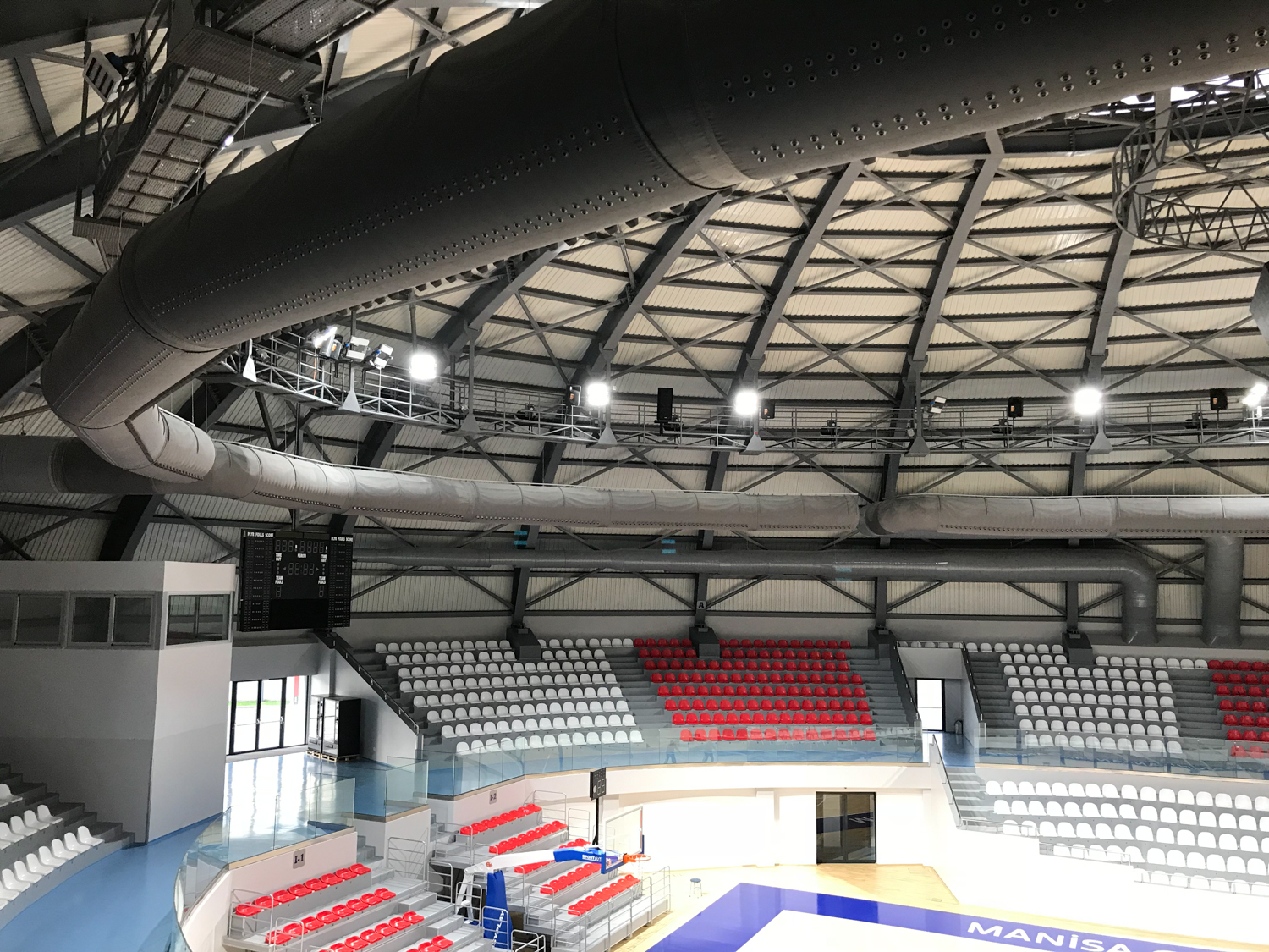 Black fabric duct in MOSB sports arena, Turkey