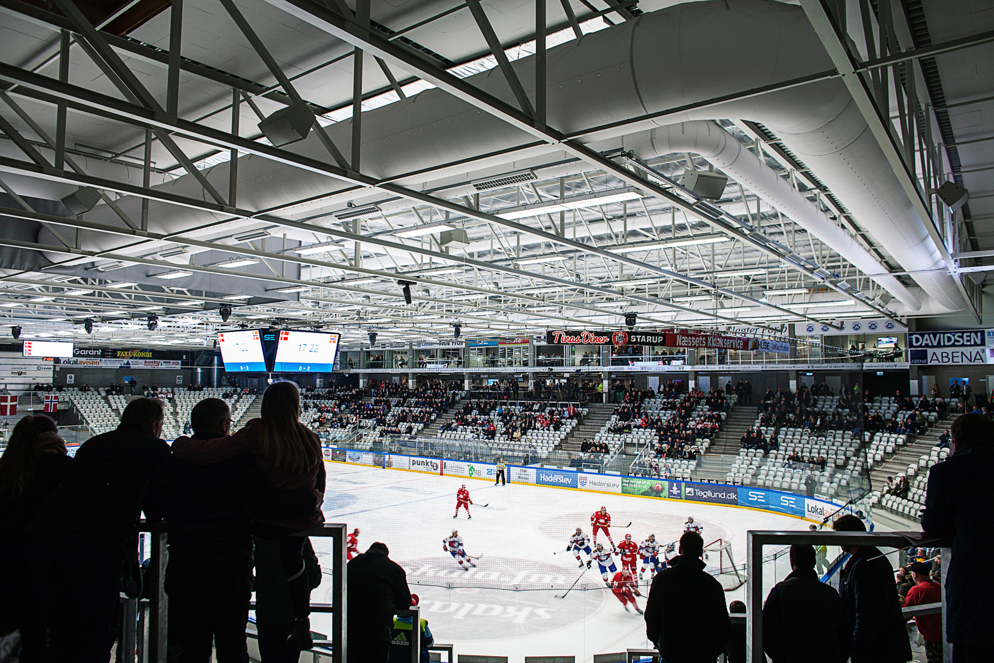 White fabric duct inside an ice rink, IN