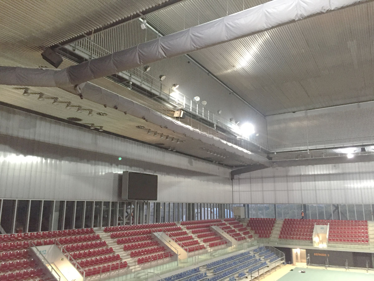 Grey air distribution system inside a tenis stadium, IN