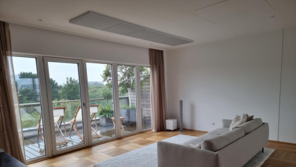 In this unique installation, five white FabricAir Ceiling Diffusers are strategically installed in this penthouse apartment living room in Bremen, Germany.