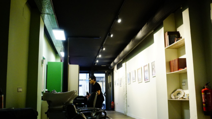 Fabric HVAC system in black fabric installed in the POL hair salon in Zaragoza, Spain