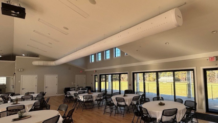 White fabric ducting replaces metal ductwork in elegant event space