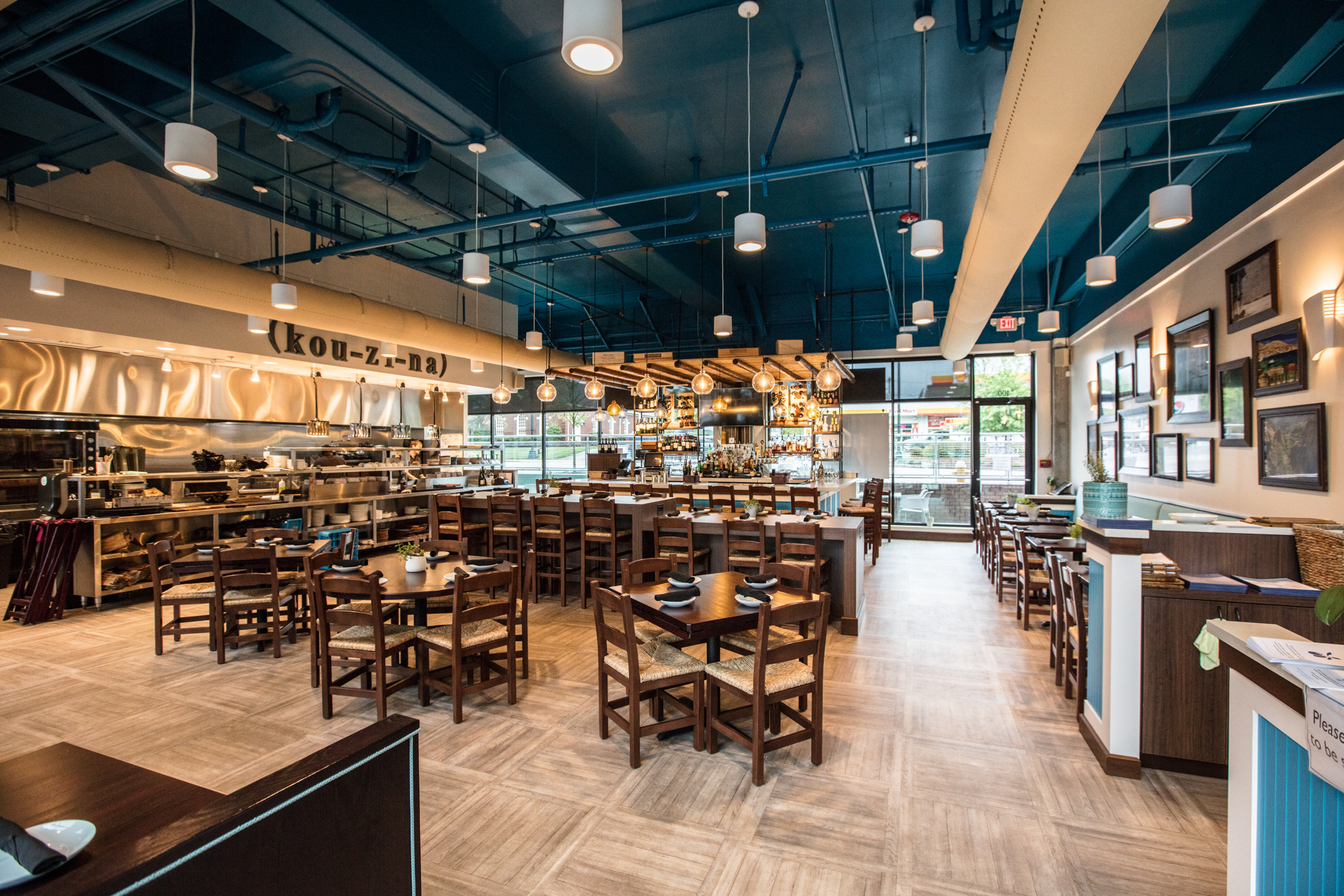 Air duct systems with white ventilation ducts installed in Ji-Roz Restaurant, USA, 2