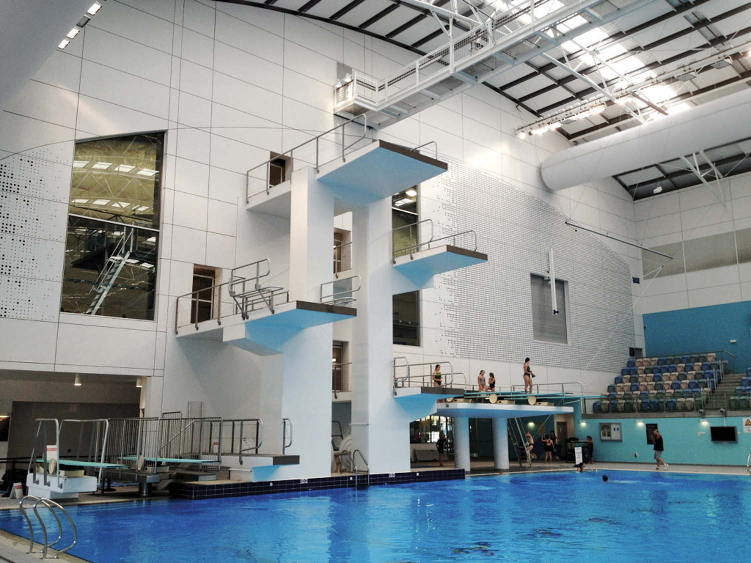 Swimming pool air duct systems with white air duct design inside State and Maron Aquatic Centre, Australia, 2