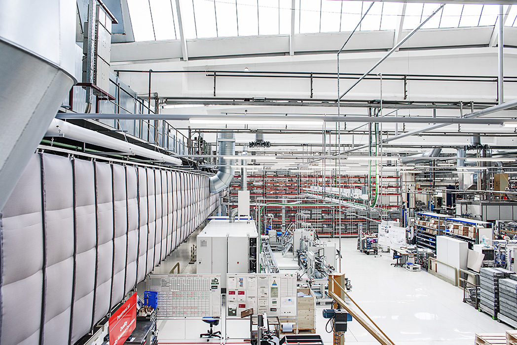 Industrial air duct systems with white ventilation ducts inside a factory Danfoss, Nordborg, Denmark, 2