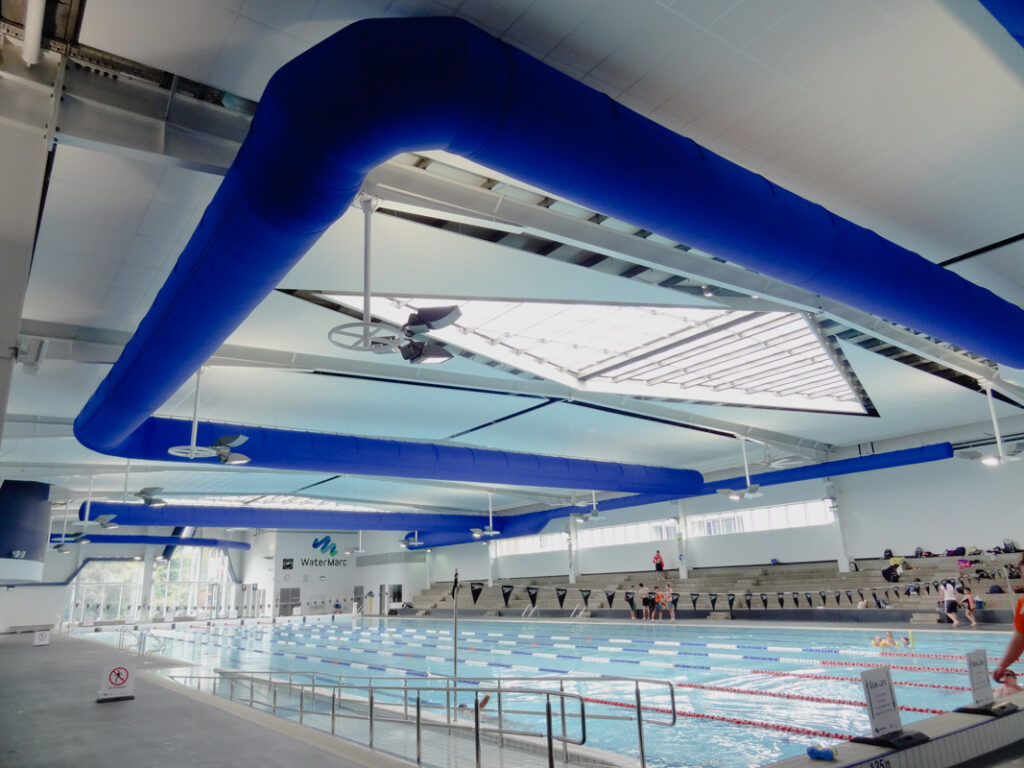 Air duct system with blue design in a swimming pool facility Watermarc, Greensborough, Australia, 2