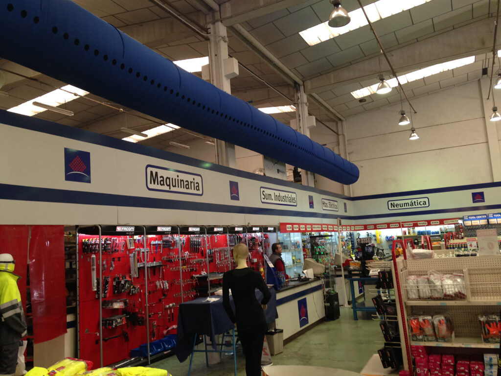 A blue air duct system with ventilation ducts inside a utility store, Metalco, Zaragoza, Spain, 1