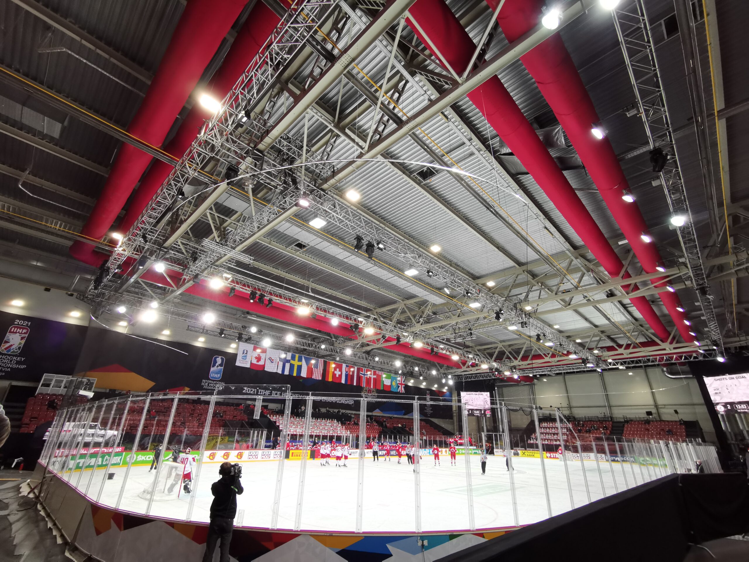 Red air duct design with ventilation ducts inside Elektrum Olympic Sports Centre, Latvia, 2