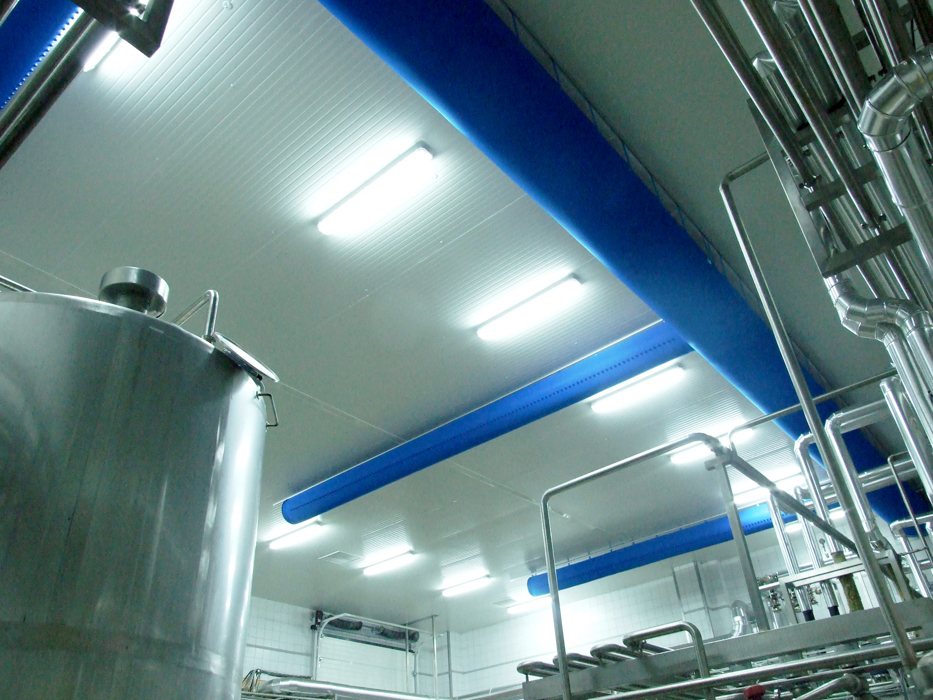 Blue air duct systems installed with fabric ducts inside an industrial factory, İtimat Süt, Turkey, 2