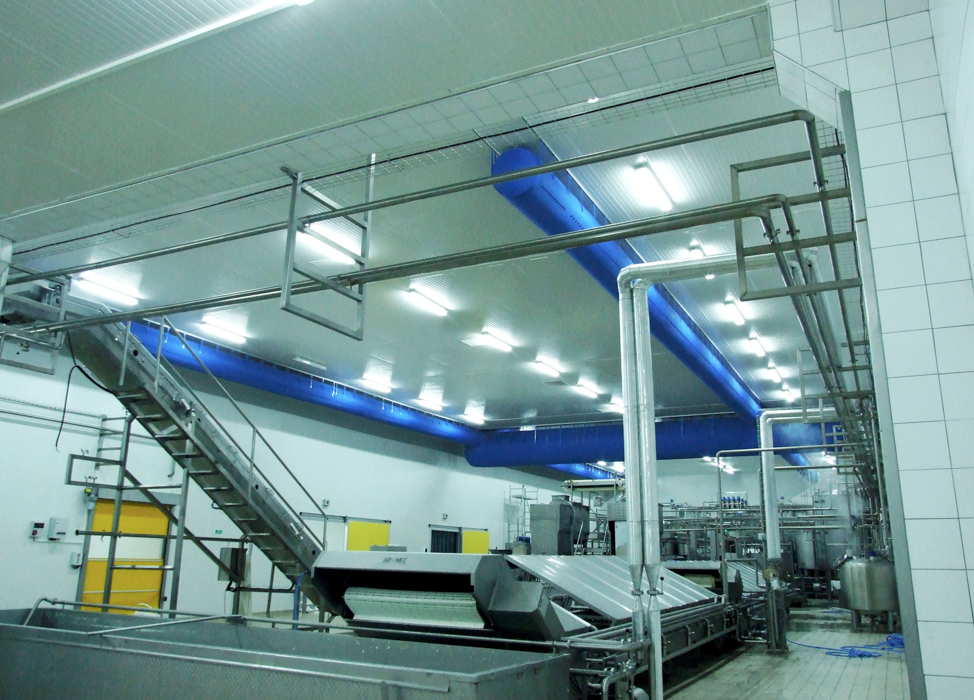 Blue air duct systems installed with ventilation ducts inside an industrial factory, İtimat Süt, Turkey, 2