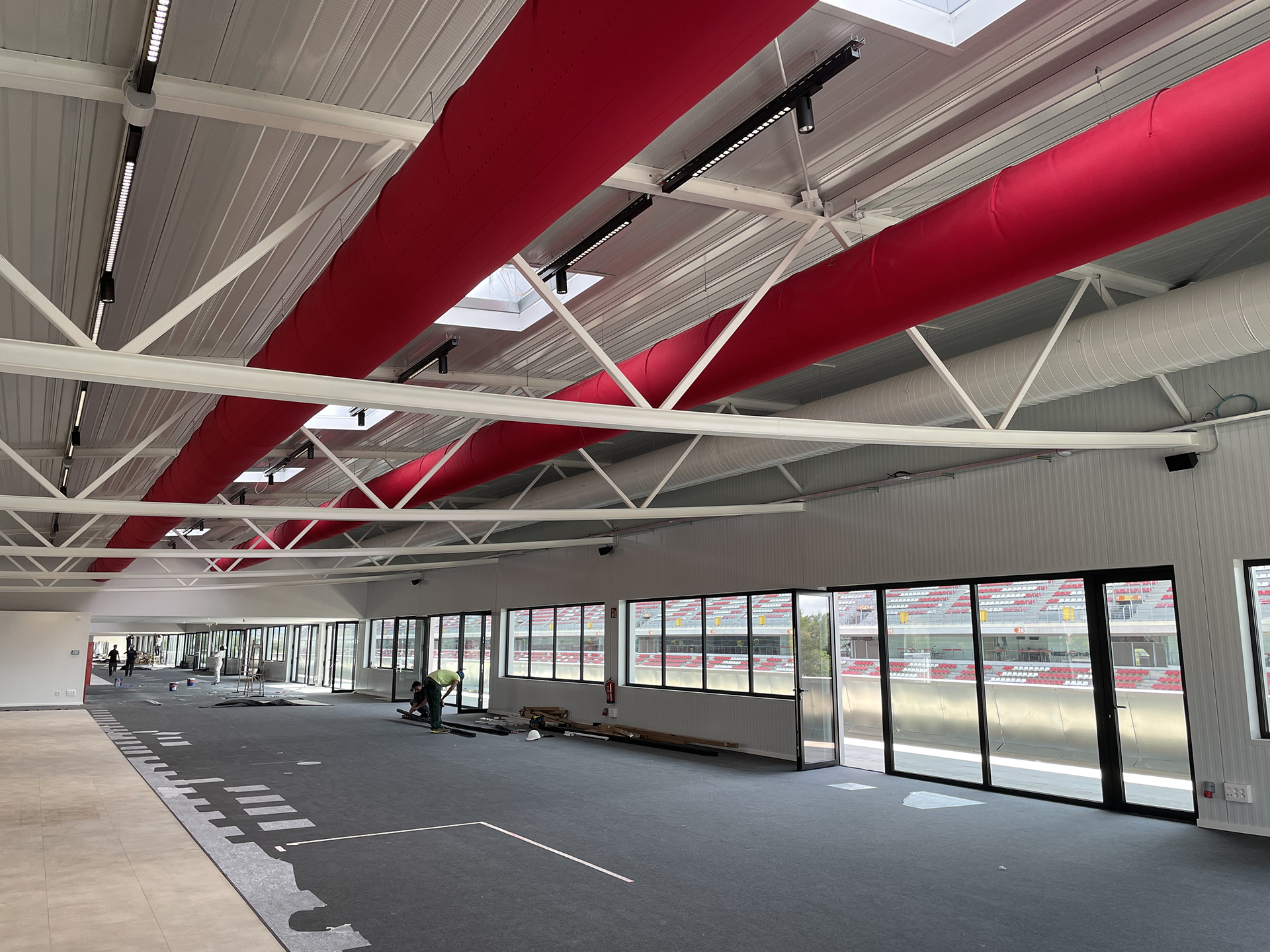Two air duct systems with red ventilation ducts installed in Cataluna Circuit, Spain, 1