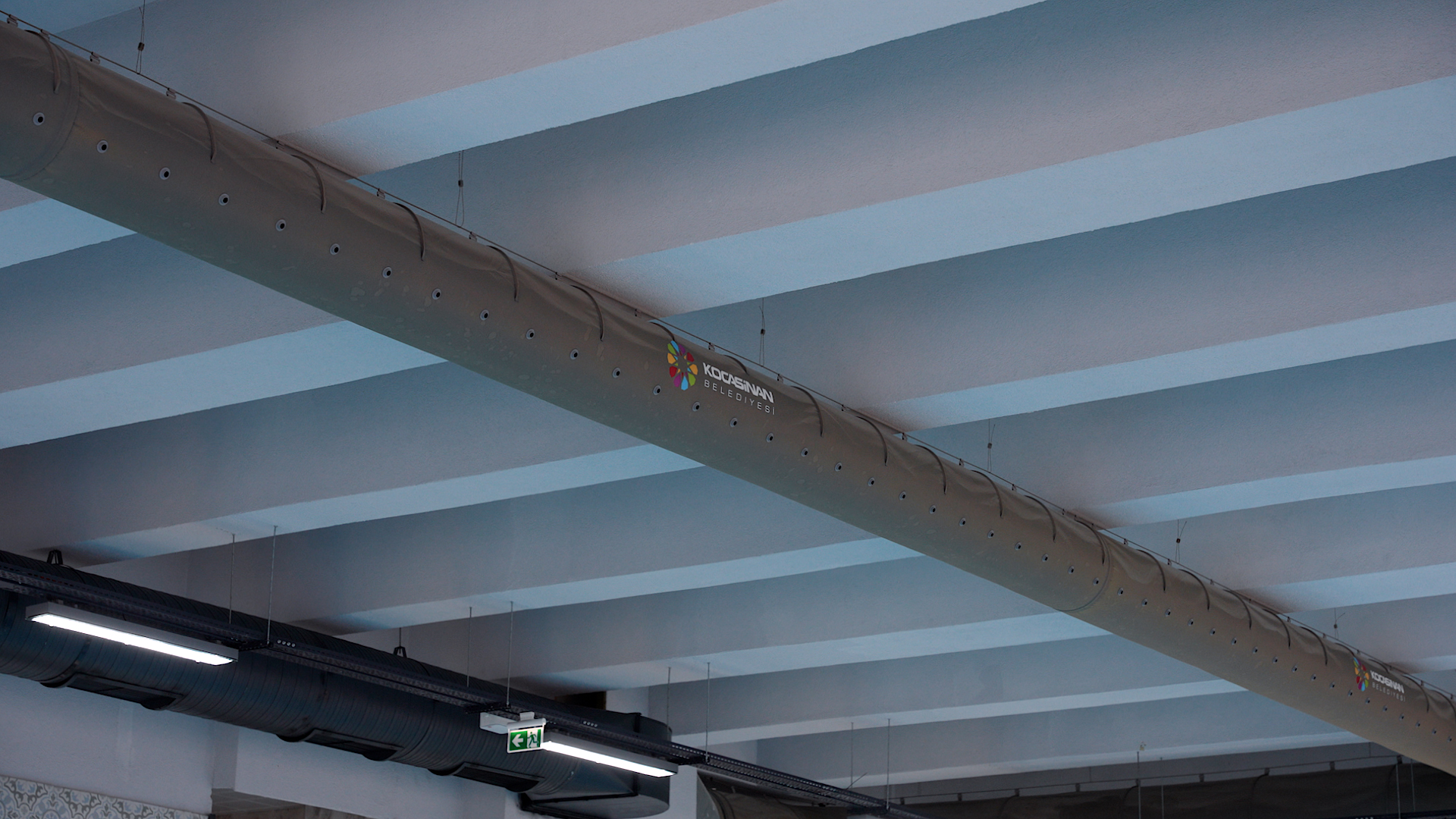 Grey fabric duct installed in Kocasisnan swimming pool, TR, 2