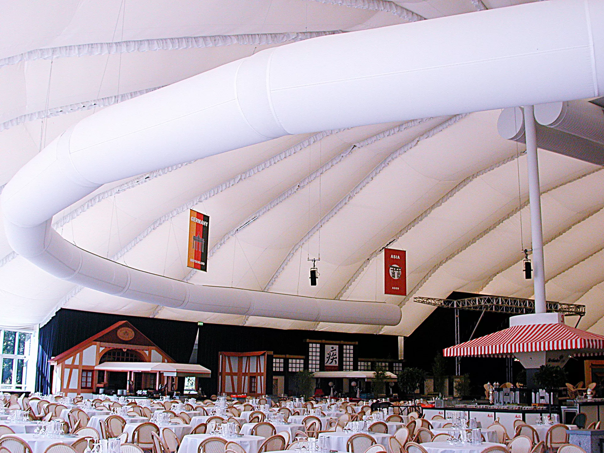 White fabric air duct in a dining area, US