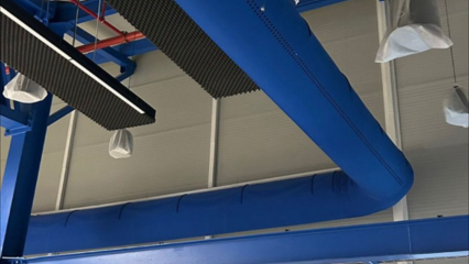 Blue FabricAir textile ducts provide comfortable, efficient airflow in auditoriums and offices.