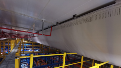 Large fabric ducts installed in the ceiling of the Novo Nordisk Warehouse in China maintain specific temperature requirements
