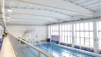 White FabricAir ducts replace metal ducts in the Kaunas Swimming School