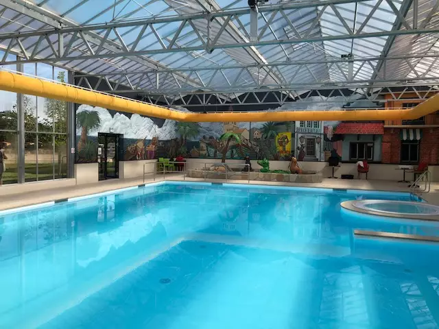 Yellow fabric air duct in Blauwe Meer holiday park swimming facilities, Lommel, Belgium
