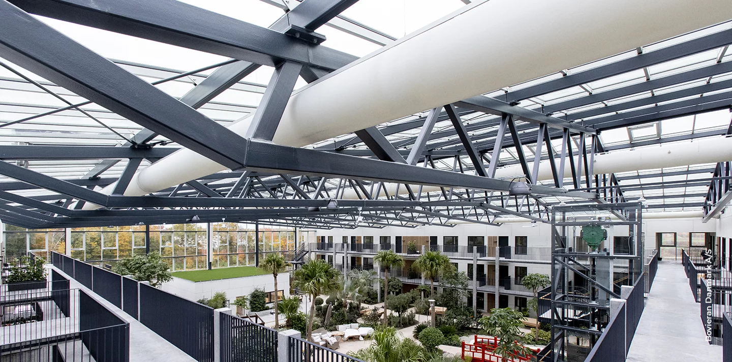 White fabric air duct installed in an appartment complex, US