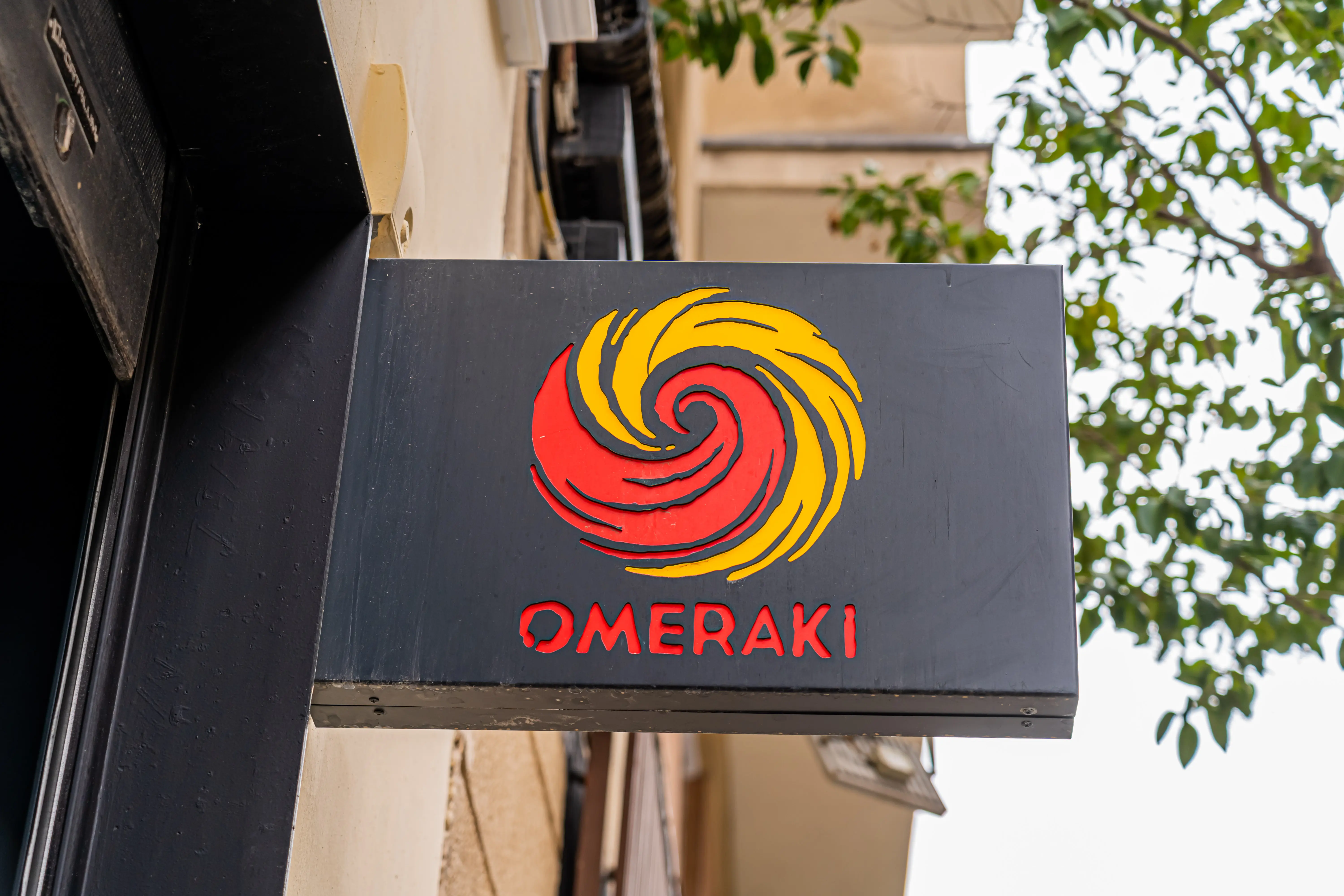 Gray fabric ducts installed in the dining room of Omeraki, a Michelin starred restaurant in Madrid.
