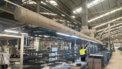 Custom printed fabric air dispersion systems ensure precise air delivery to occupied spaces in the Vitrinor factory in Spain