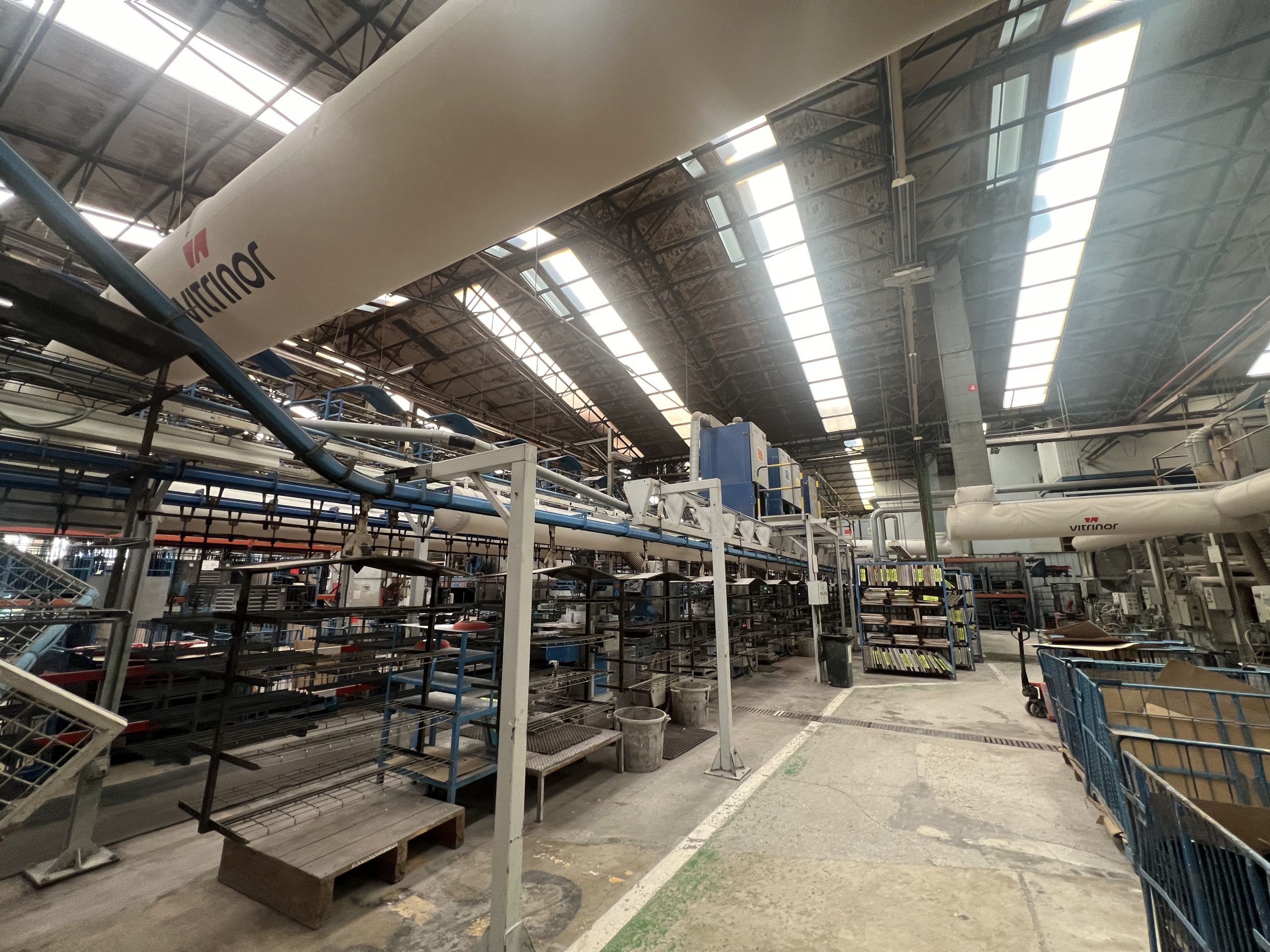 Custom printed fabric air dispersion systems ensure precise air delivery to occupied spaces in the Vitrinor factory in Spain