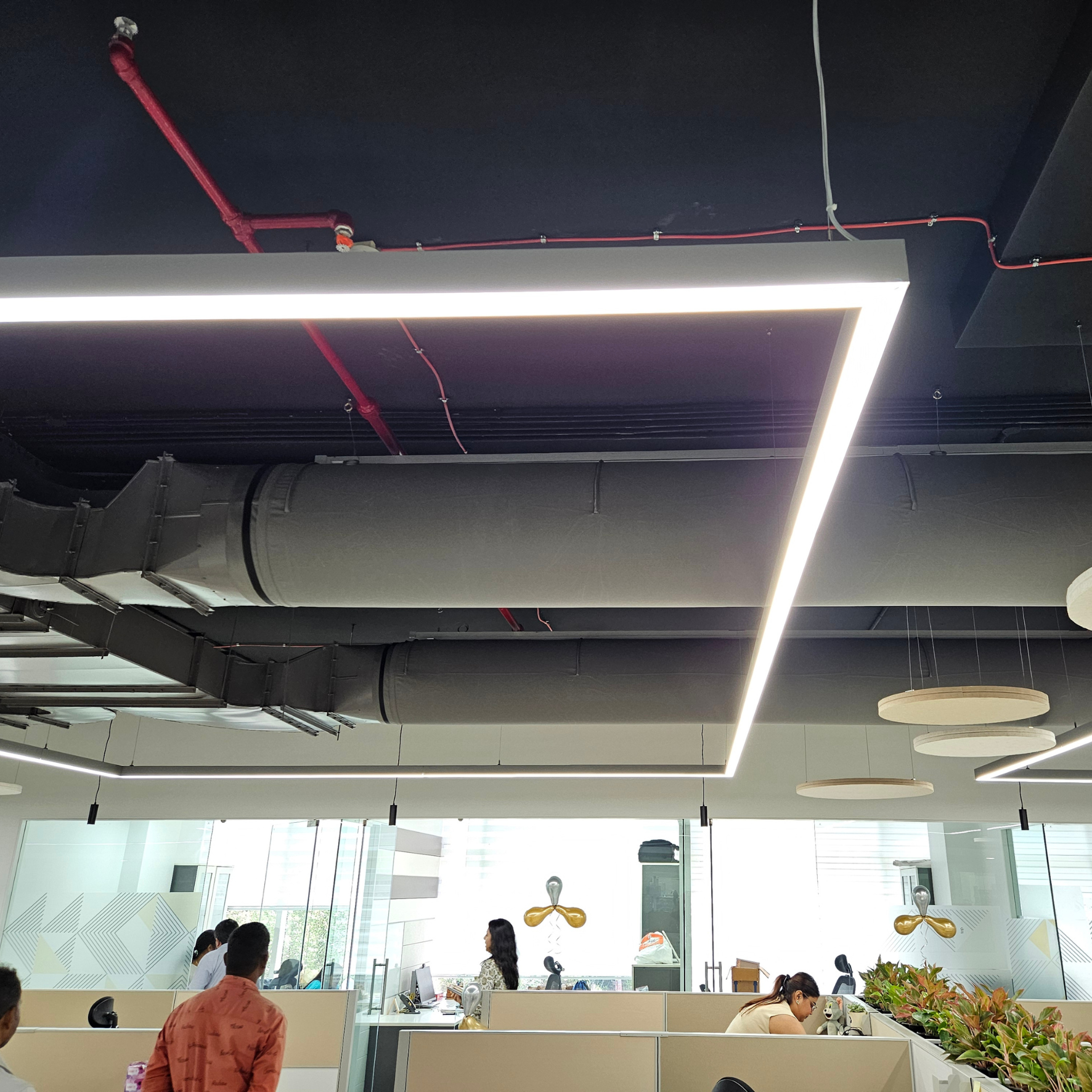 Gray fabric duct system installed in office space