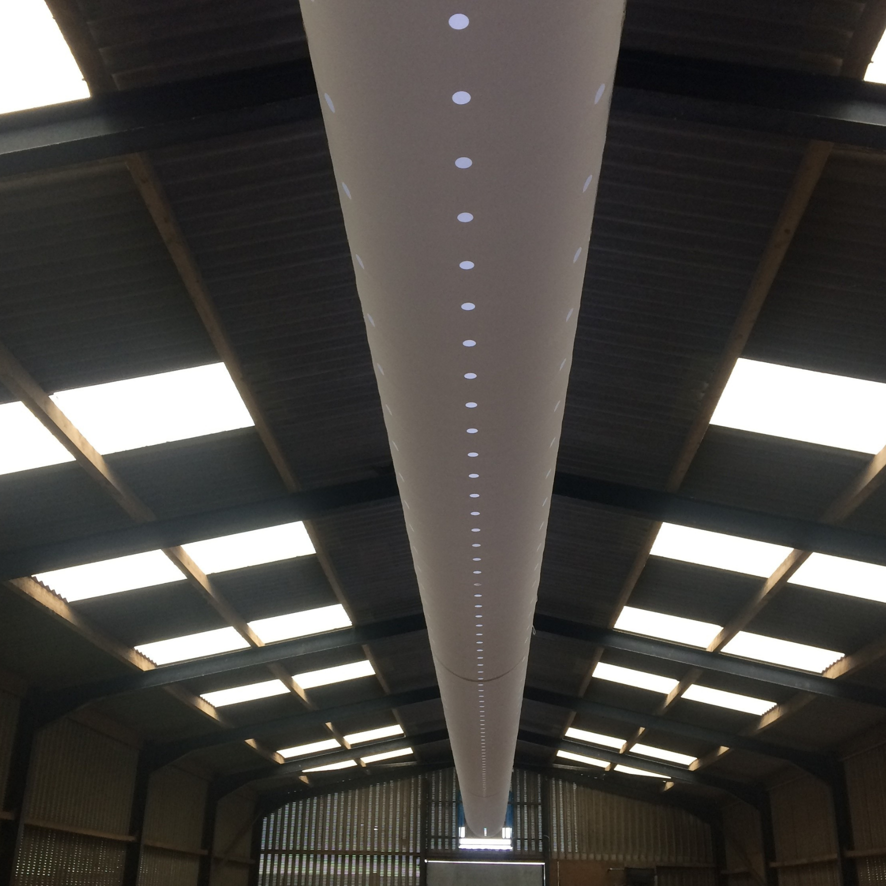 Fabric ducting provides air distribution for livestock environments