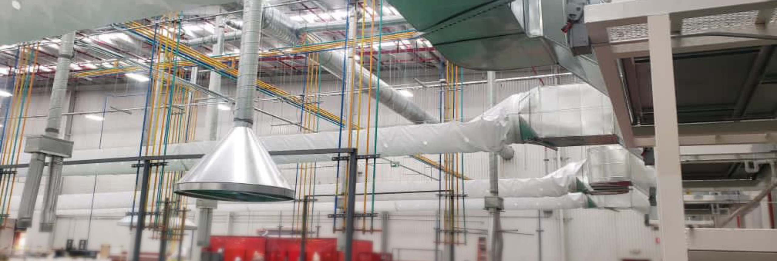 White fabric ducts provide precision airflow for the Mitsubishi automotive plant in Mexico.