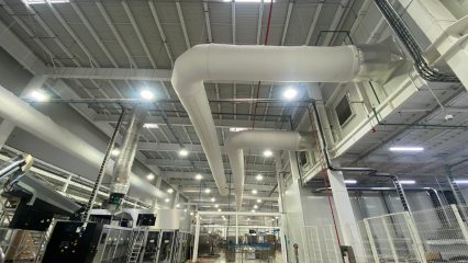 White fabric ducts elevate the indoor air quality inside the JUMEX juice plant in Monterrey, Mexico