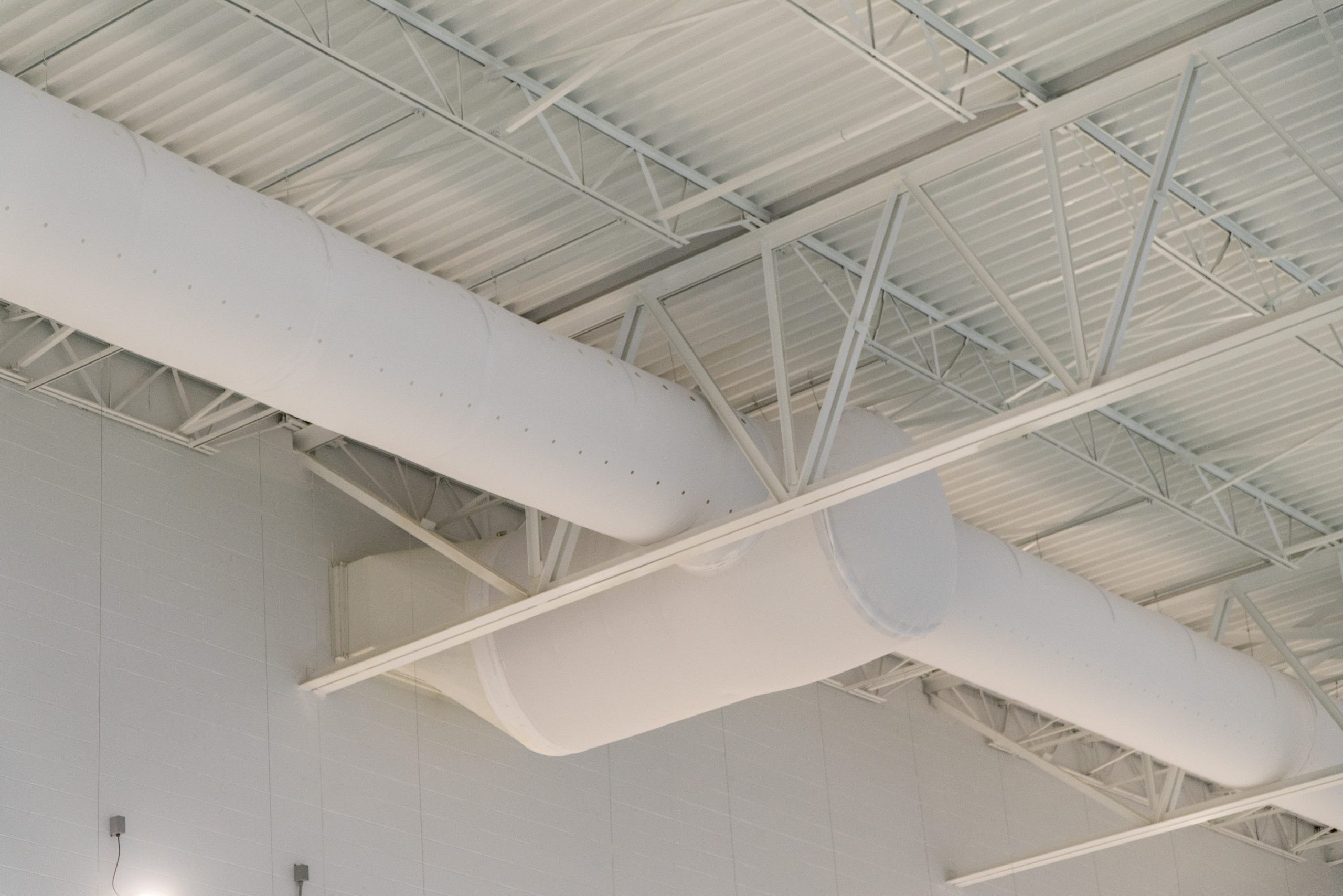 White FabricAir ducting in the Aquatic Center at Mylan Park at West Virginia University
