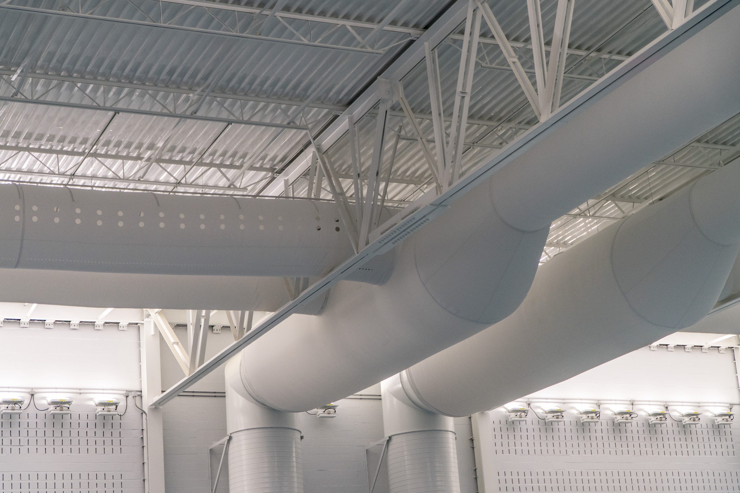 White FabricAir ducting in the Aquatic Center at Mylan Park at West Virginia University