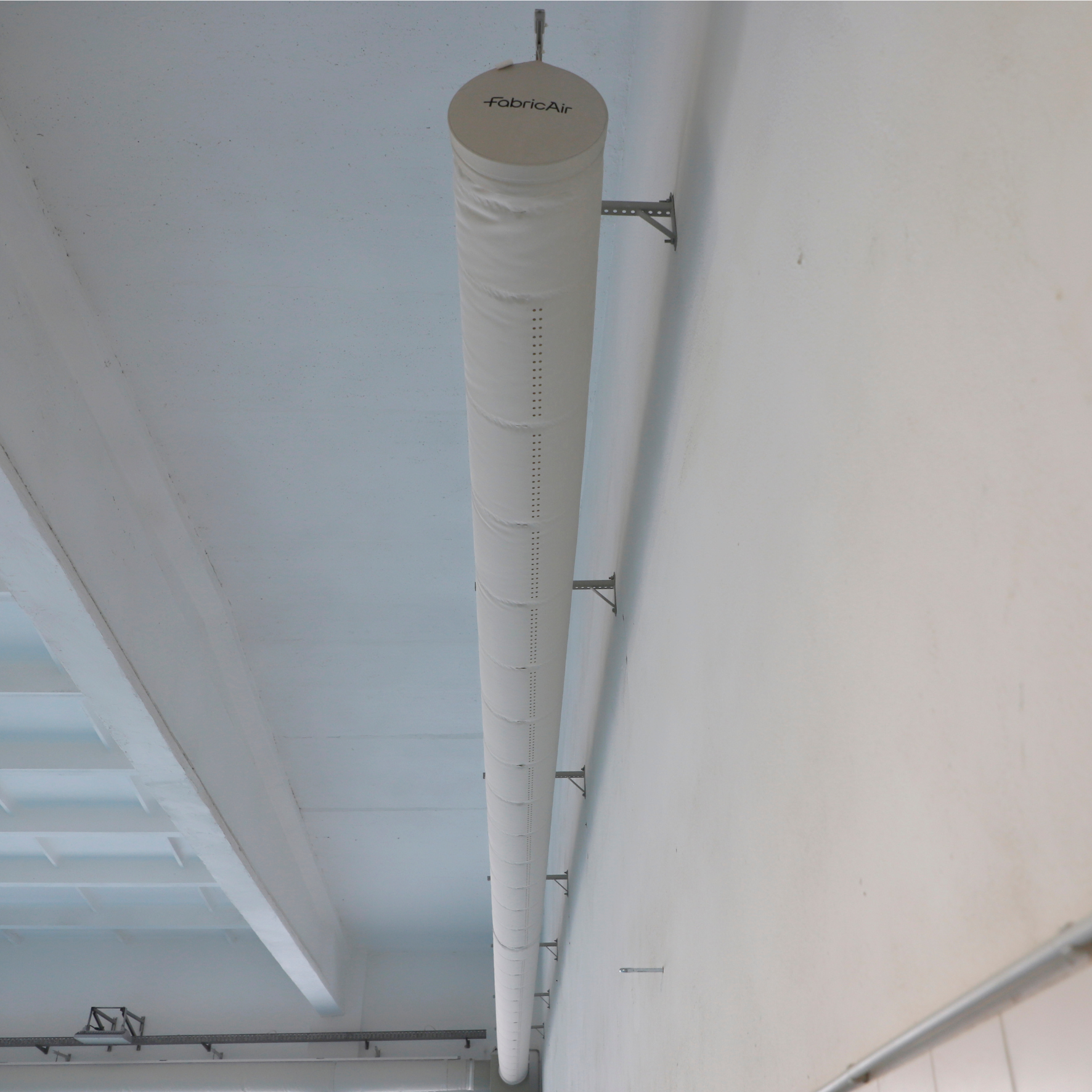 White FabricAir ducts replace metal ducts in the Kaunas Swimming School
