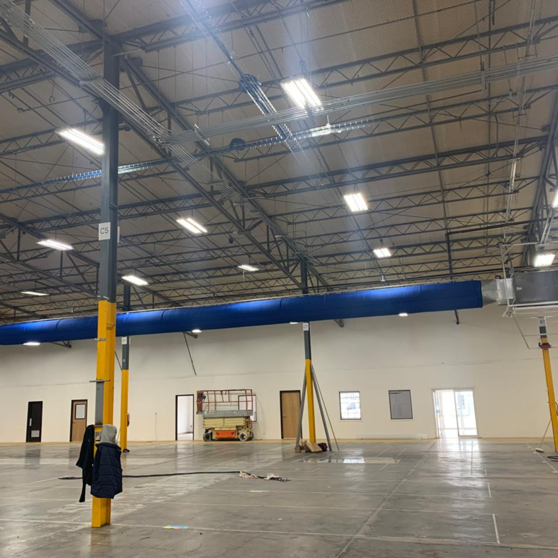 Blue fabric ducting installed in the MACOSA manufacturing facility in Mexico