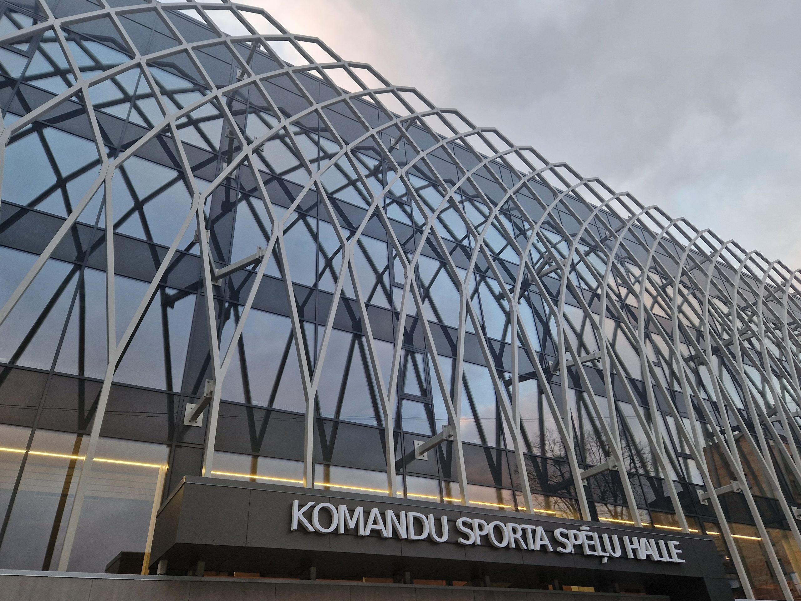 Sleek black fabric duct system improves indoor air quality in the National Sport Centre of Latvia